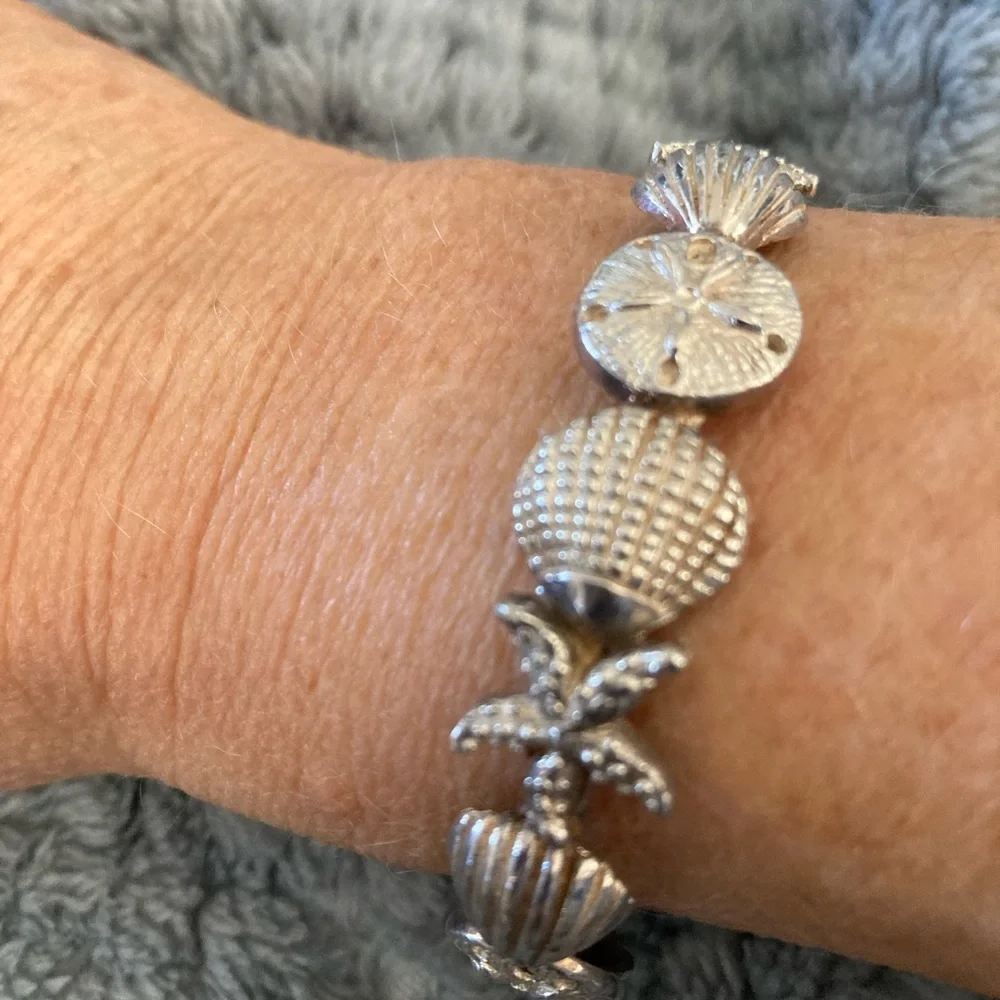 SOLD-Vintage 1990s sterling silver bangle,sea shells,sand dollars & star fish. - Picture 1 of 7